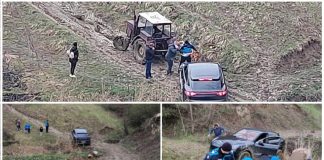 porsche blocat pe un drum forestier